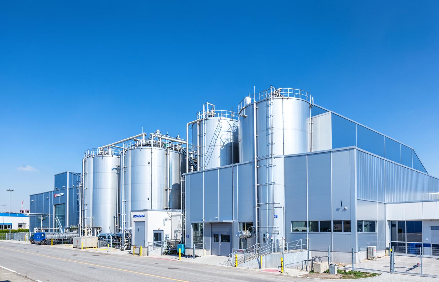 VerdantChem factory exterior with storage tanks
